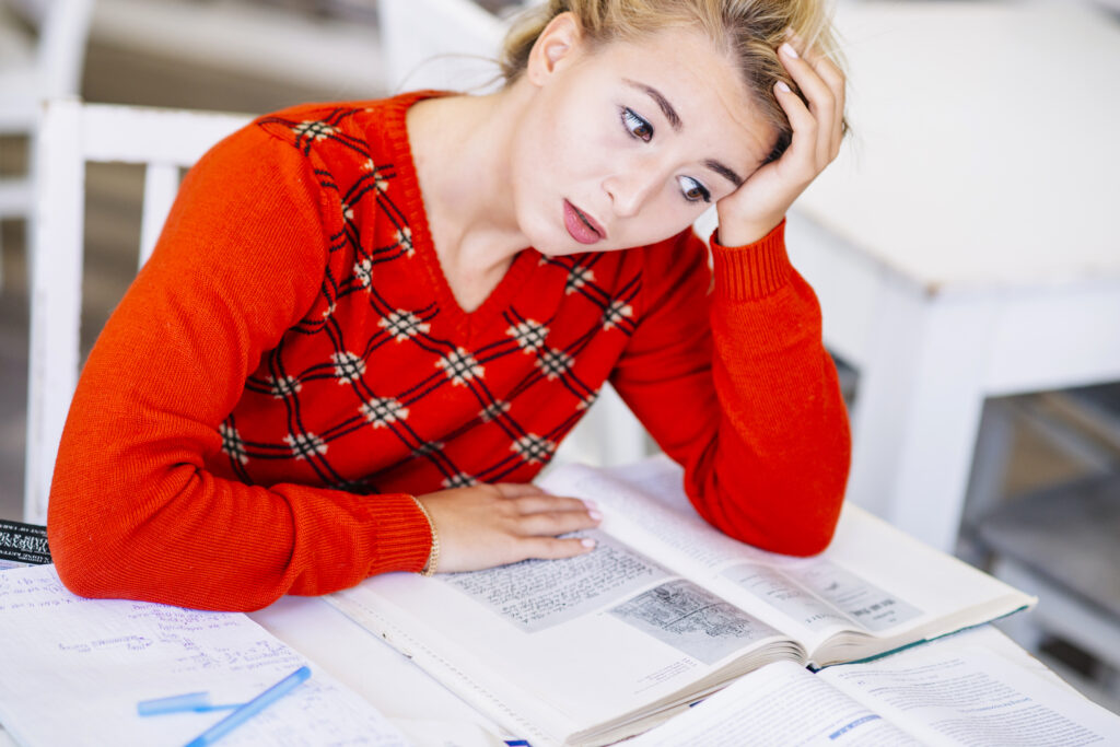 young woman studying exam